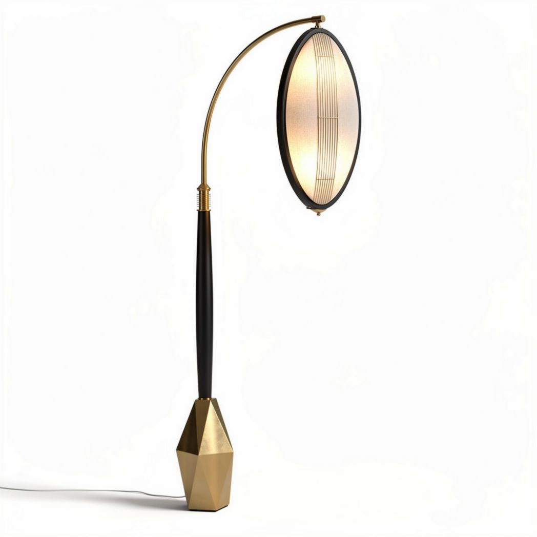 Arched floor lamp with oval shade and geometric base in gold and black finish